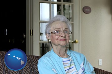 a senior woman in an assisted living facility - with Hawaii icon