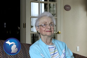 a senior woman in an assisted living facility - with Michigan icon