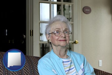 a senior woman in an assisted living facility - with New Mexico icon