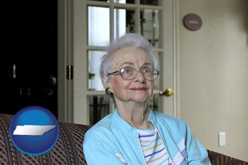 a senior woman in an assisted living facility - with Tennessee icon